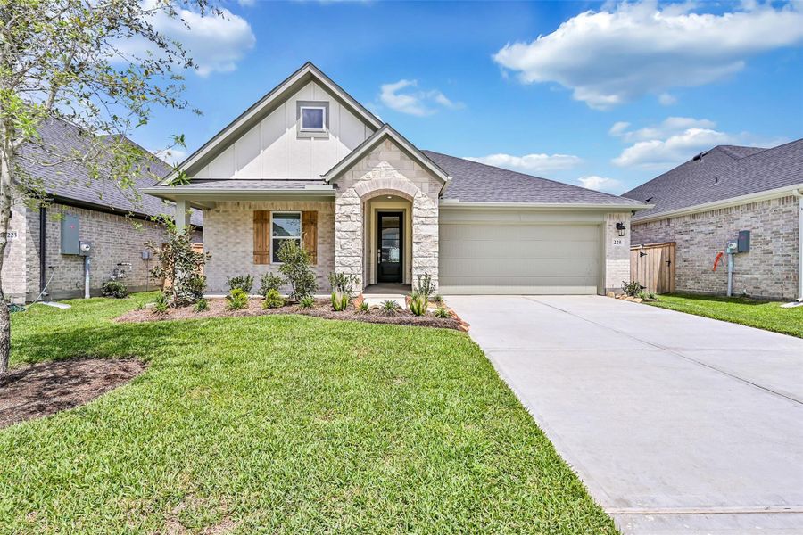 Front exterior of a new home in Laurel Landing, Alvin, TX, highlighting curb appeal (Image 2).
