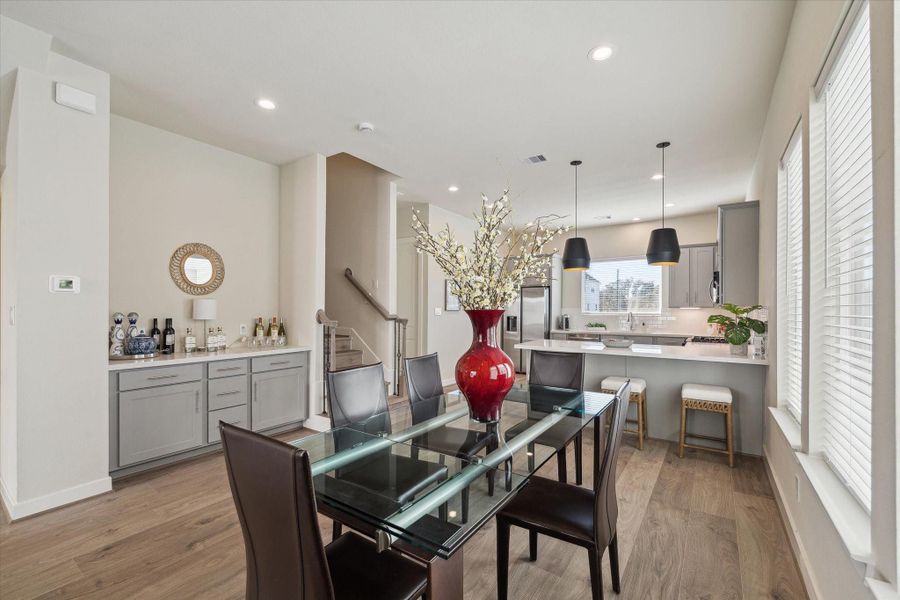 The open kitchen overlooks the dining and living areas, keeping everyone connected while cooking or entertaining.
