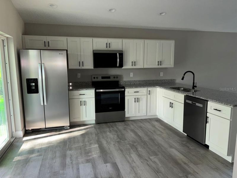 Furnished interior view inside a new home in , Dunnellon (Image 6).