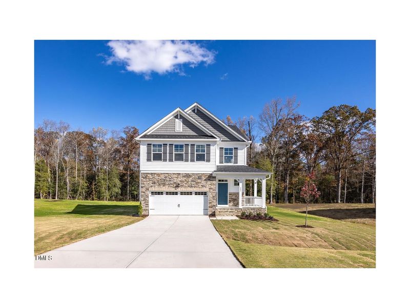 Front exterior of a new home in Wellers Knoll, Lillington, NC, highlighting curb appeal (Image 1).