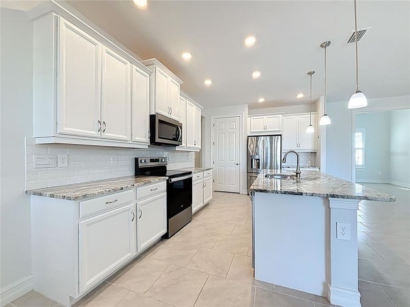 Furnished interior view inside a new home in , Port Charlotte (Image 15).