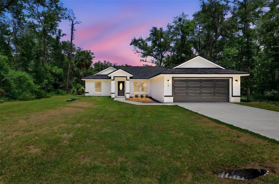 Front exterior of a new home in , Ocklawaha, FL, highlighting curb appeal (Image 1). Front exterior of a new home in , Ocklawaha, FL, highlighting curb appeal (Image 1).
