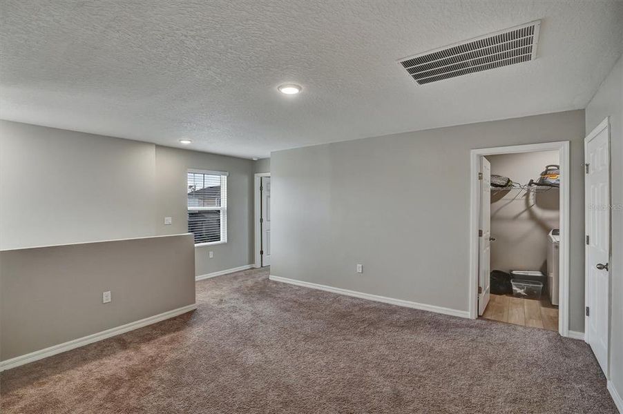 Spacious, unfurnished interior of a new home in Hammock Reserve, Haines City (Image 18).