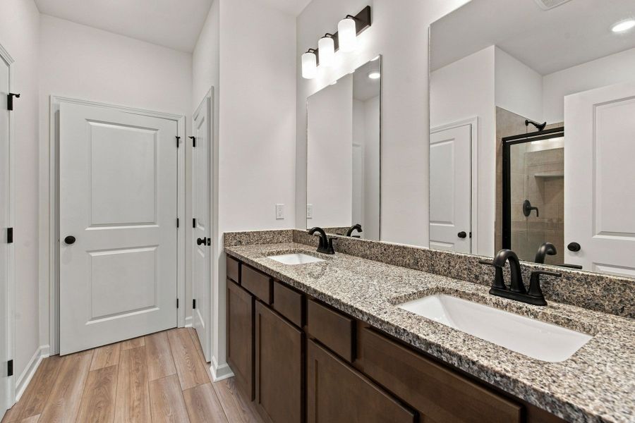 These pictures are of another unit of the same floor plan. Design selections will vary.