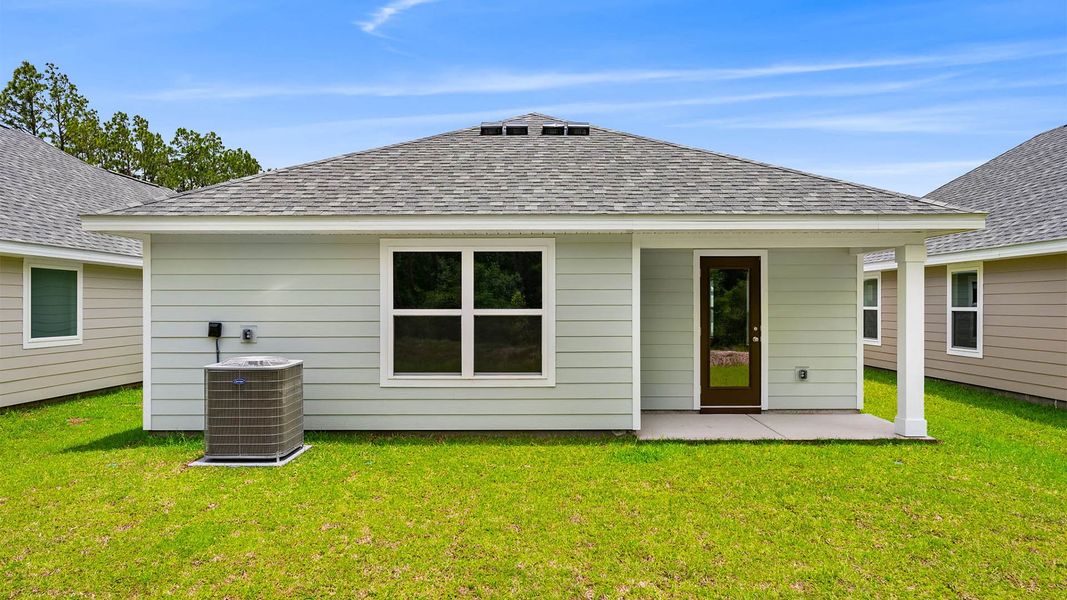 Exterior details and patio area of a home in Chateau Nemours, Port Saint Joe (Image 17).