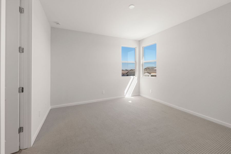 Spacious, unfurnished interior of a new home in Harvest - Enchantment Series, Queen Creek (Image 31). Spacious, unfurnished interior of a new home in Harvest - Enchantment Series, Queen Creek (Image 31).