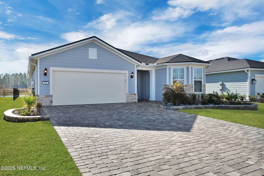 Front exterior of a new home in , St. Augustine, FL, highlighting curb appeal (Image 24).