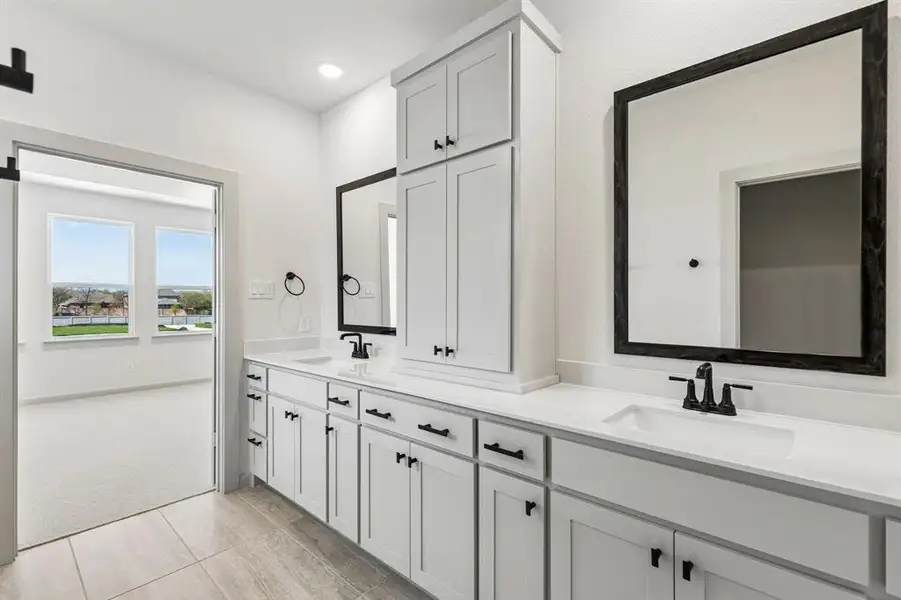 Ample rooms for two in this wonderful owner's bath. Ample rooms for two in this wonderful owner's bath.