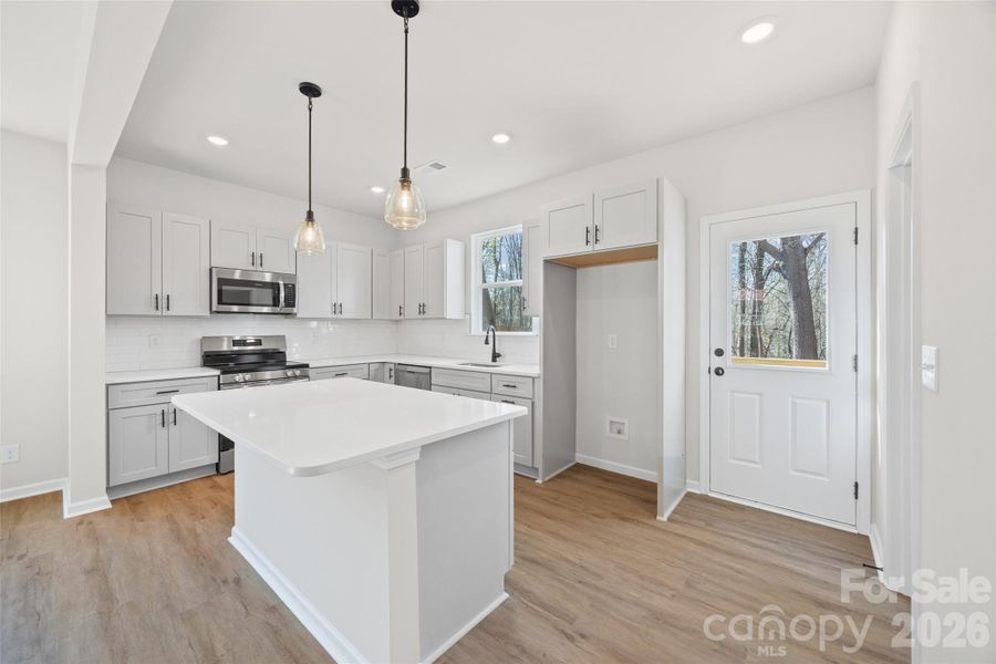 Furnished interior view inside a new home in , Belmont (Image 6).