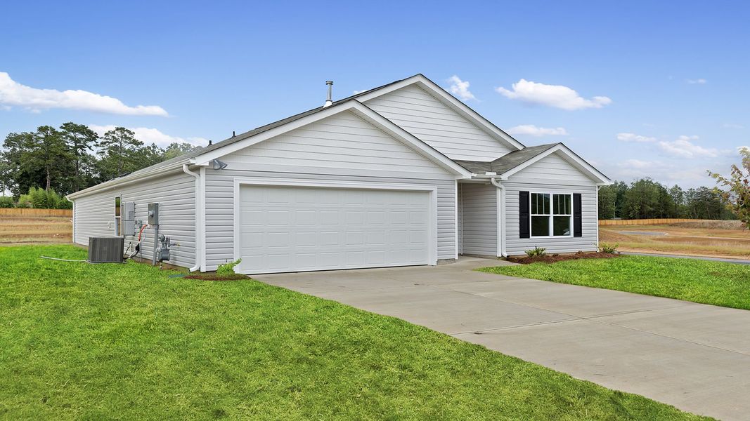 Front exterior of a new home in Lightwood Cottages, Moore, SC, highlighting curb appeal (Image 2).