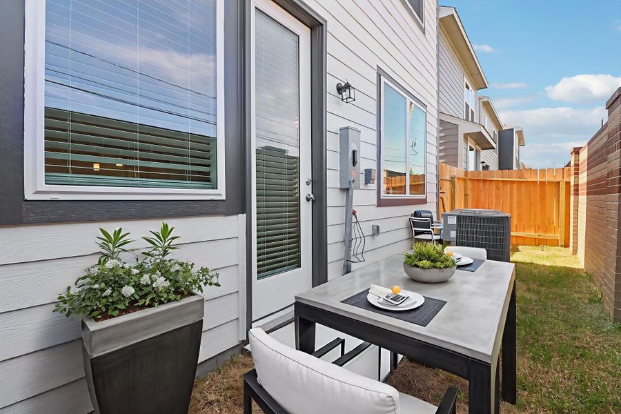 Exterior details and patio area of a home in Spring Brook Village - City Series, Houston (Image 3).