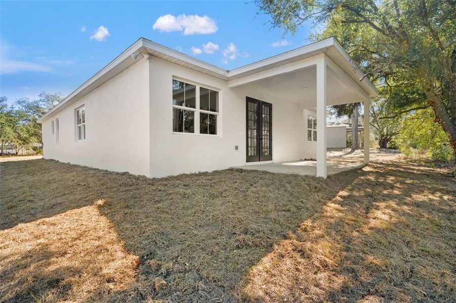 Exterior details and patio area of a home in , Citrus Springs (Image 32).