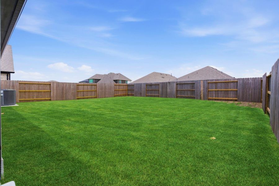 Exterior details and patio area of a home in Creekhaven, Iowa Colony (Image 30). Exterior details and patio area of a home in Creekhaven, Iowa Colony (Image 30).
