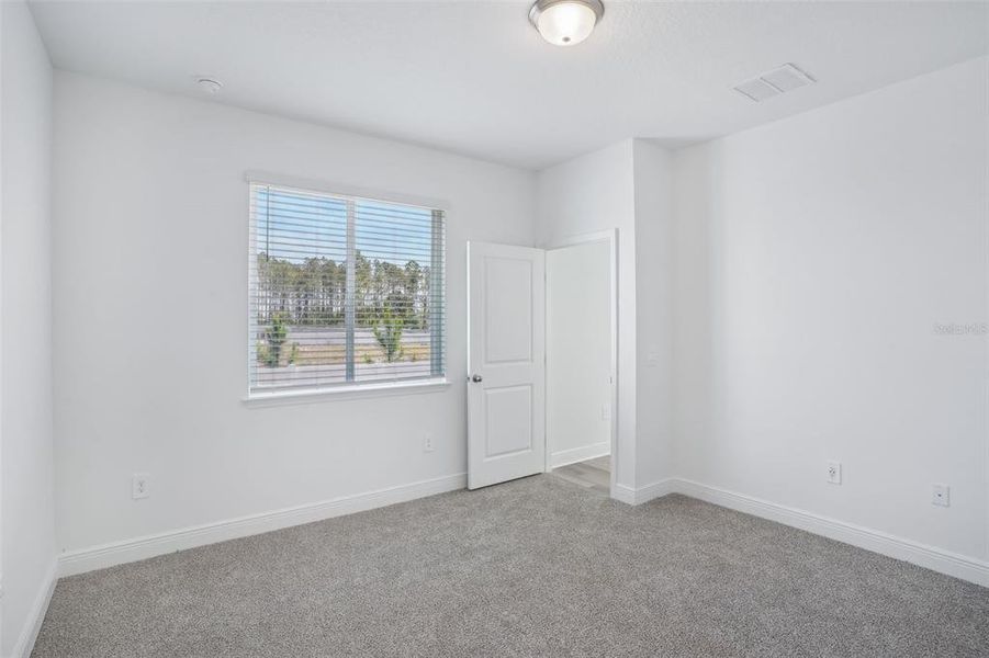 Spacious, unfurnished interior of a new home in Cyrene at Minneola - Villas, Montverde (Image 14). Spacious, unfurnished interior of a new home in Cyrene at Minneola - Villas, Montverde (Image 14).