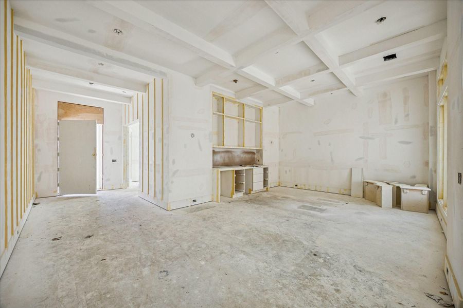 A coffered ceiling highlights this sophisticated dining room. Photo taken on Feb 9.