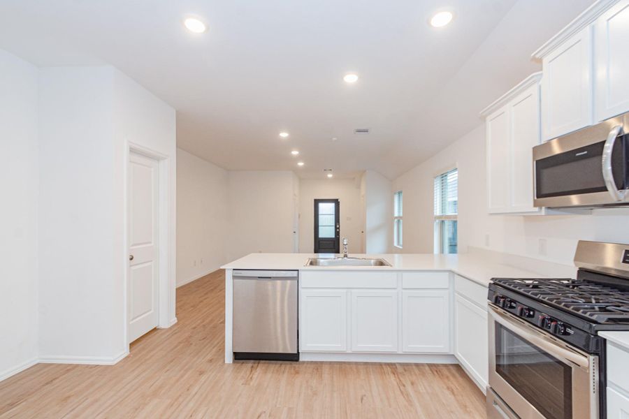 Furnished interior view inside a new home in Newport Preserve, Crosby (Image 5).