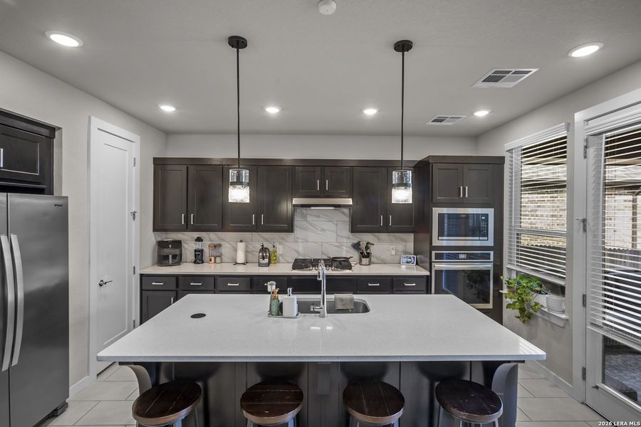Furnished interior view inside a new home in VIDA, San Antonio (Image 18).