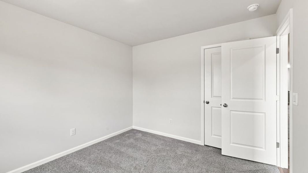 Spacious, unfurnished interior of a new home in Village 3, Woodruff (Image 29).
