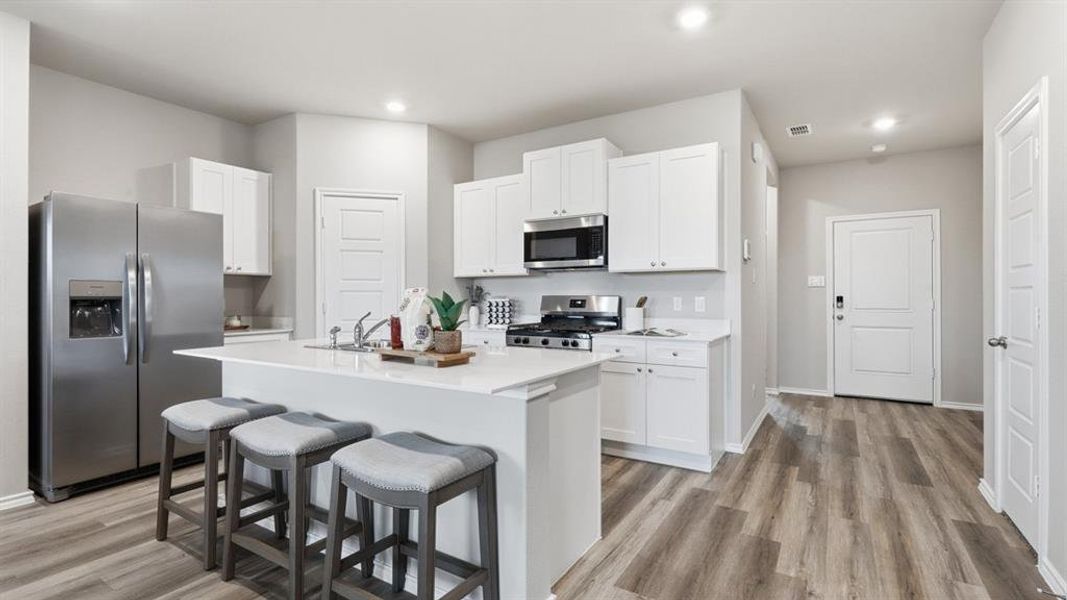 Kitchen - All Home and community information, including pricing, included features, terms, availability and amenities, are subject to change at any time without notice or obligation. All Drawings, pictures, photographs, video, square footages, floor plans, elevations, features, colors and sizes are approximate for illustration purposes only and will vary from the homes as built.