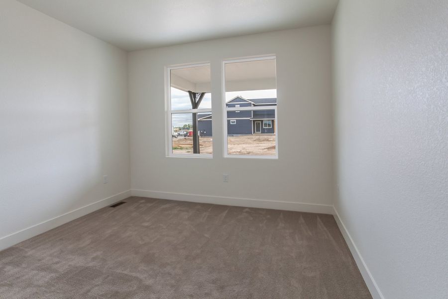 Spacious, unfurnished interior of a new home in Prairie Song, Windsor (Image 29).