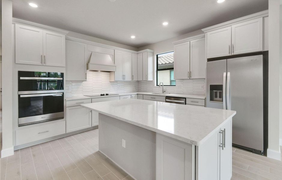 Furnished interior view inside a new home in Preserve at Waterway Village, Vero Beach (Image 6).