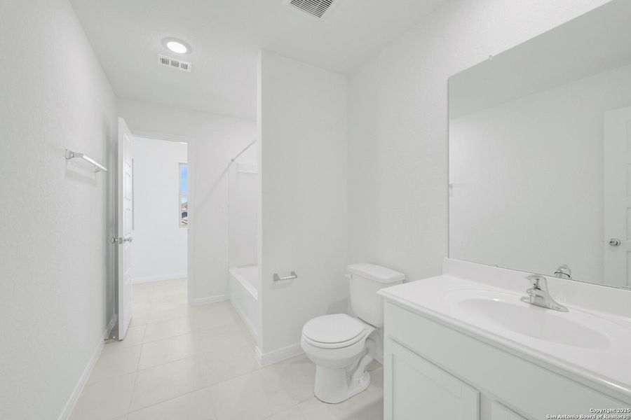 Furnished interior view inside a new home in Winding Brook, San Antonio (Image 5).