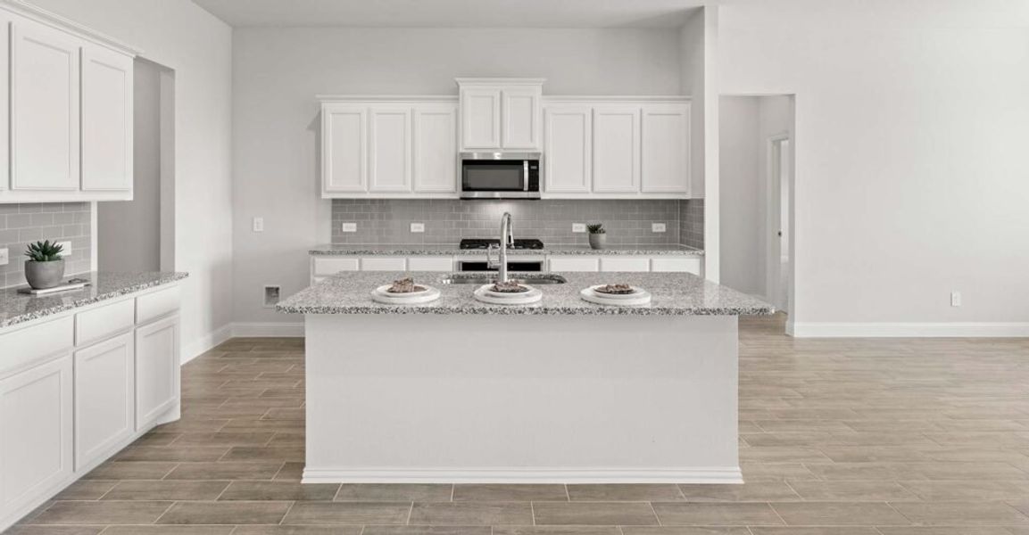 Representative exterior photo of a completed home built from the Hampton by Impression Homes in Still Water Lake, Godley, TX (Image 4). Representative exterior photo of a completed home built from the Hampton by Impression Homes in Still Water Lake, Godley, TX (Image 4).