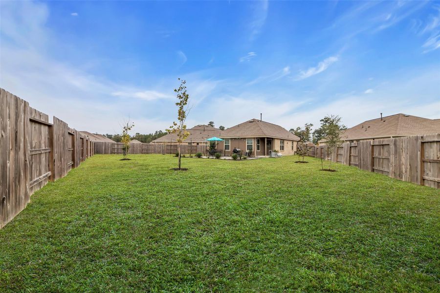 Do you need a lawn that can accommodate a pool? A playset? Lots of running room for your kids/grandkids or dogs?  This backyard is for you.