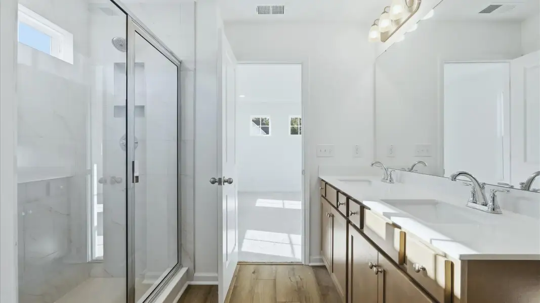 The Pritchard offers a stylish primary bath with double sinks