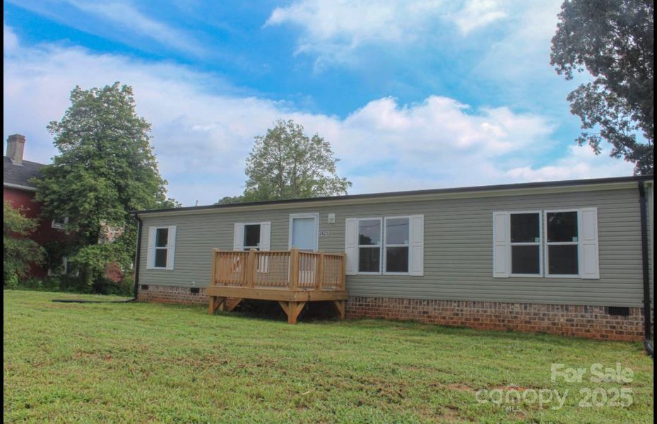 Front exterior of a new home in , Statesville, NC, highlighting curb appeal (Image 2).