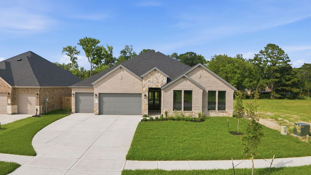 Front exterior of a new home in Friendswood Trails 70' Homesites, Friendswood, TX, highlighting curb appeal (Image 19).