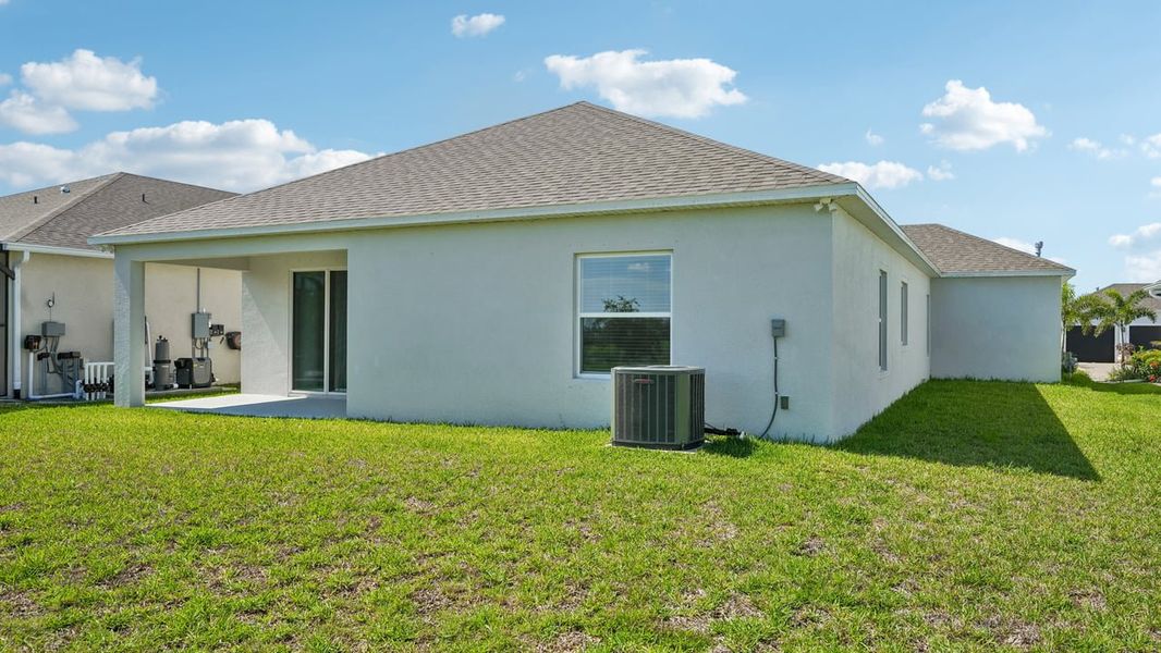 Exterior details and patio area of a home in Heritage Station, Punta Gorda (Image 34).