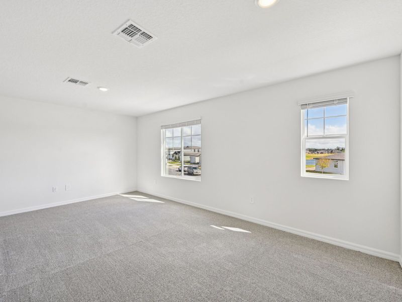 Spacious, unfurnished interior of a new home in Oakfield Trails - Premier Series, Parrish (Image 10).