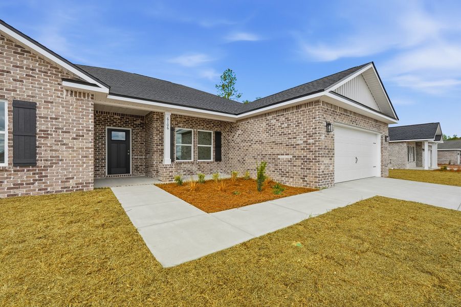 Exterior details and patio area of a home in Southern Charm, Crestview (Image 27).