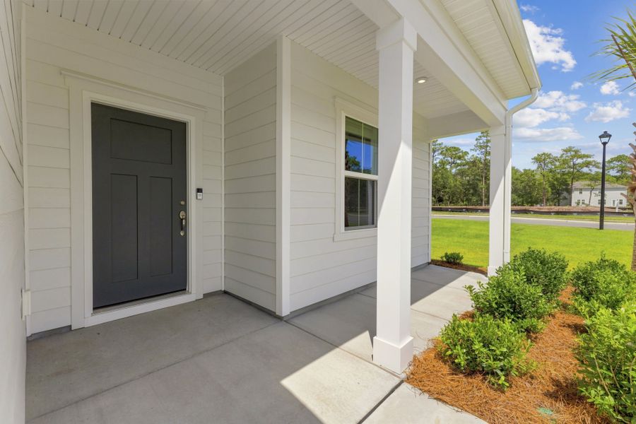 Exterior details and patio area of a home in Solserra, Shallotte (Image 18).