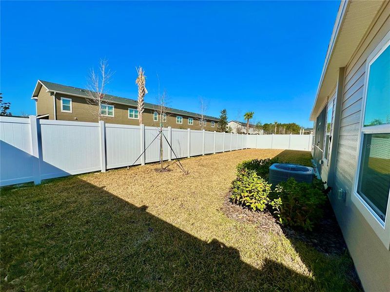 Exterior details and patio area of a home in Pioneer Ranch, Ocala (Image 3).