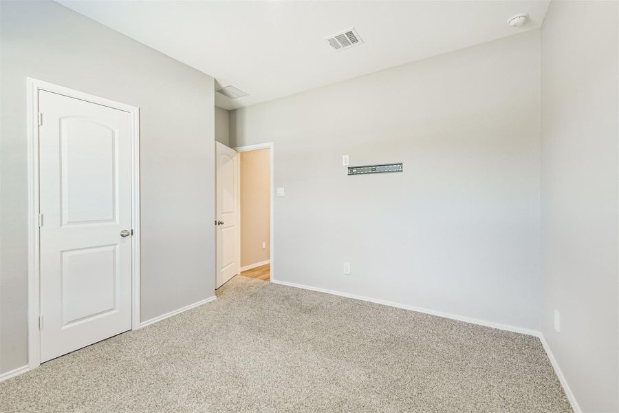 Spacious, unfurnished interior of a new home in Harrington Trails at The Canopies, New Caney (Image 37).