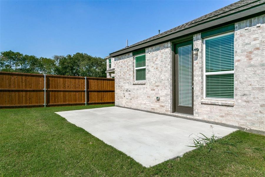 Exterior details and patio area of a home in The Preserve, Justin (Image 19). Exterior details and patio area of a home in The Preserve, Justin (Image 19).