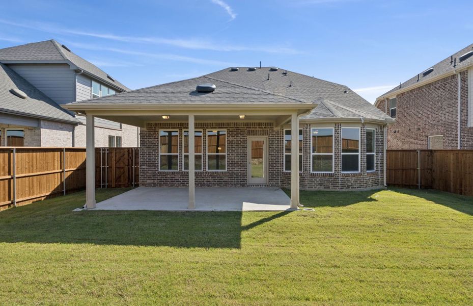 Exterior details and patio area of a home in Creekview Meadows, Pilot Point (Image 1). Exterior details and patio area of a home in Creekview Meadows, Pilot Point (Image 1).