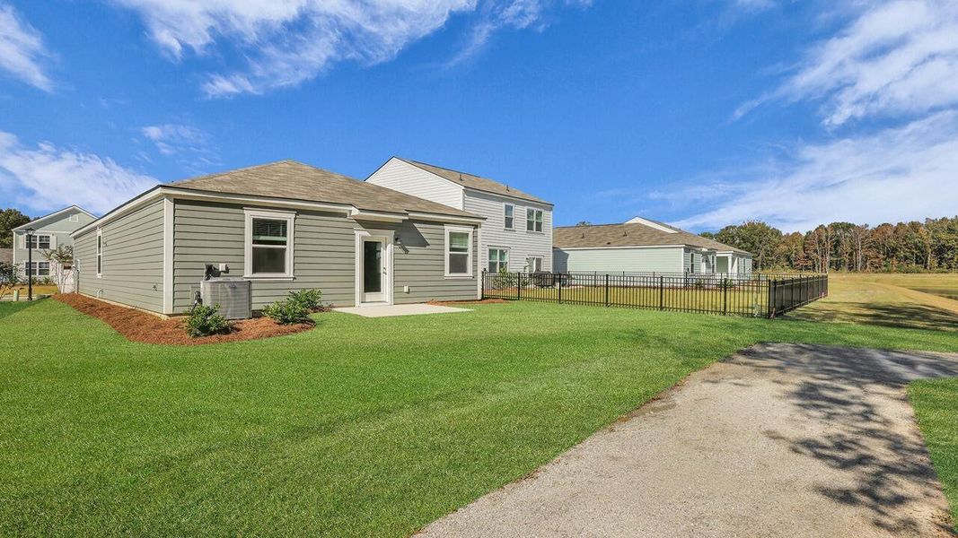 Exterior details and patio area of a home in The Oaks at Center Station, Hollywood (Image 2). Exterior details and patio area of a home in The Oaks at Center Station, Hollywood (Image 2).
