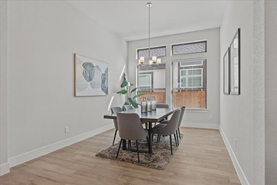 Representative furnished interior of a home built from the Bradley by Chesmar Homes in Sweetwater, Austin (Image 7).