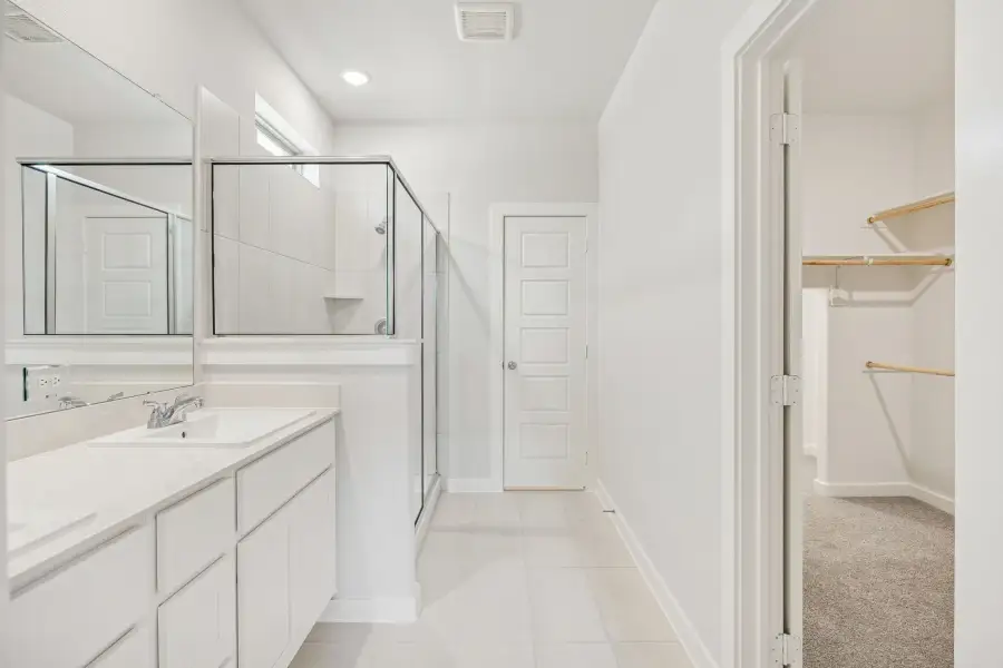 Primary Bathroom in the Stanley II home plan by Trophy Signature Homes – REPRESENTATIVE PHOTO Primary Bathroom in the Stanley II home plan by Trophy Signature Homes – REPRESENTATIVE PHOTO