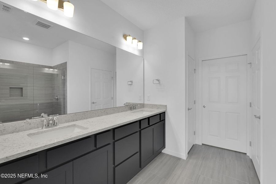 Furnished interior view inside a new home in Del Webb Wildlight, Yulee (Image 12).