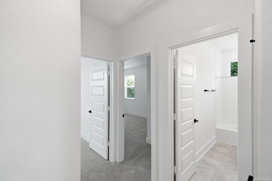 Spacious, unfurnished interior of a new home in The Reserve at Potranco Oaks, Castroville (Image 35).