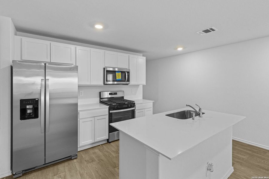 Furnished interior view inside a new home in Hickory Ridge, Elmendorf (Image 12).