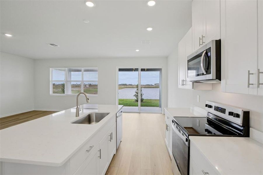 Furnished interior view inside a new home in Coasterra - Reserve Series, Palmetto (Image 13).