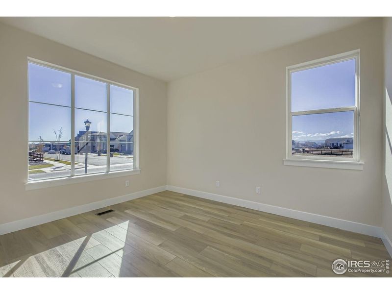 Spacious, unfurnished interior of a new home in RainDance, Windsor (Image 22).