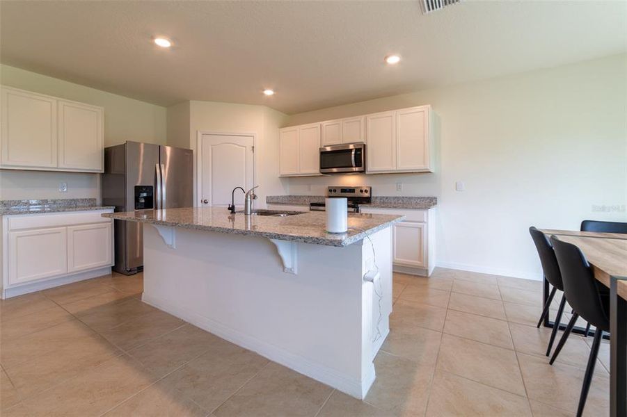 Furnished interior view inside a new home in , Harmony (Image 8).