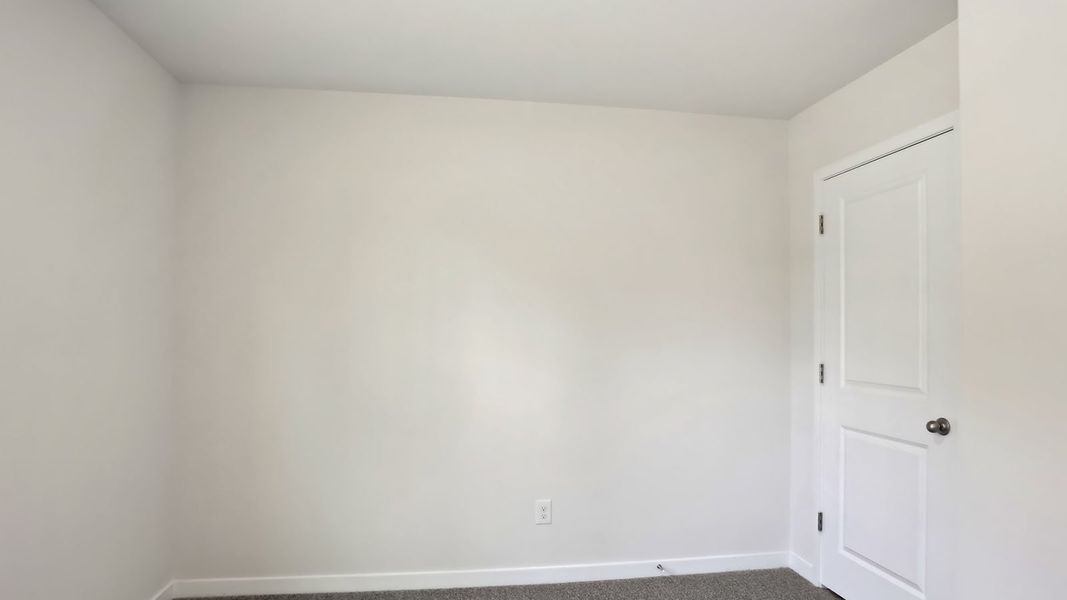 Spacious, unfurnished interior of a new home in Tap Root Farms, Fletcher (Image 20).