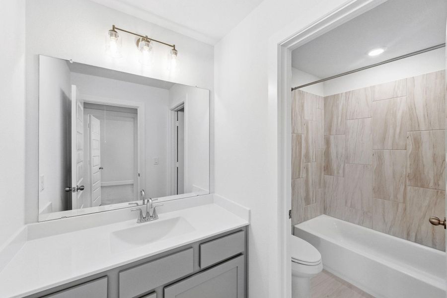 Furnished interior view inside a new home in The Colony - 50', Bastrop (Image 6). Furnished interior view inside a new home in The Colony - 50', Bastrop (Image 6).